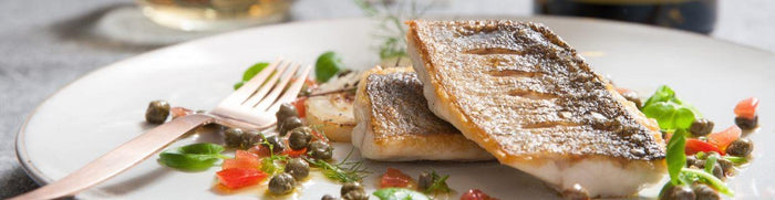 Welke wijn bij zeebaars? Van ceviche tot op de huid gebakken