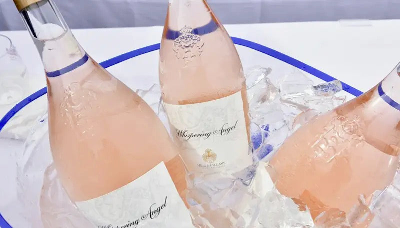 Rosé fles en glas