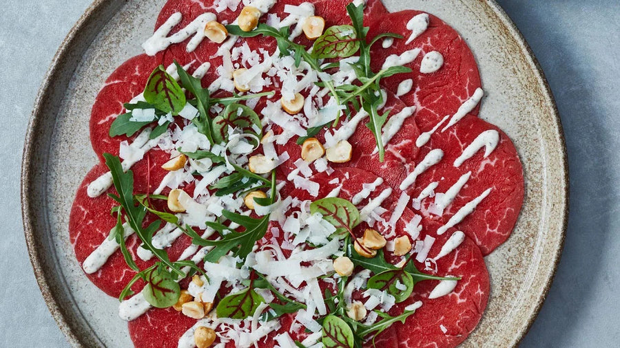 Carpaccio met dressing (banner)