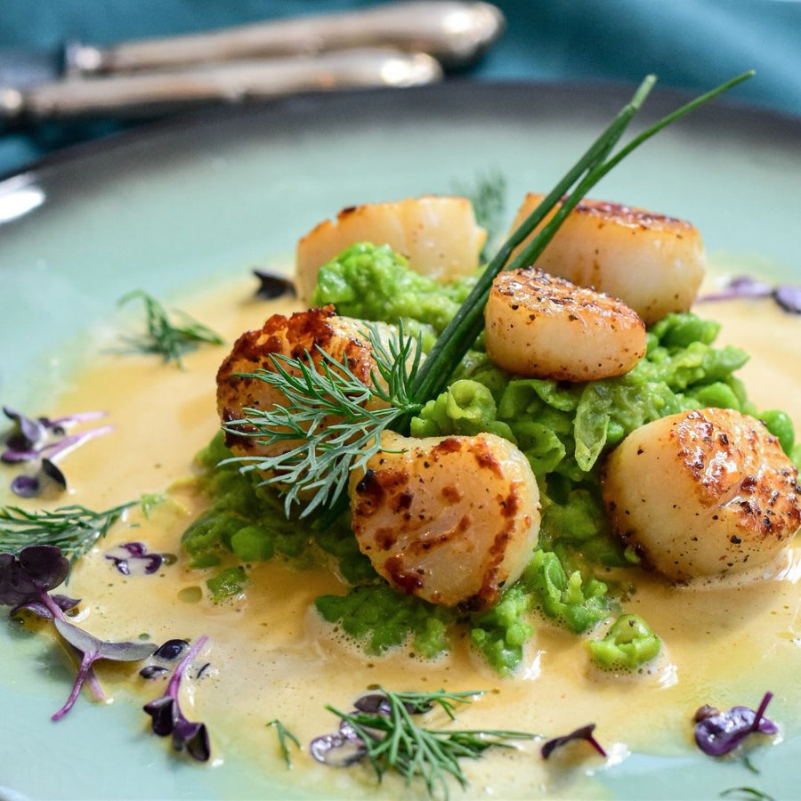 Coquilles aan tafel (banner)